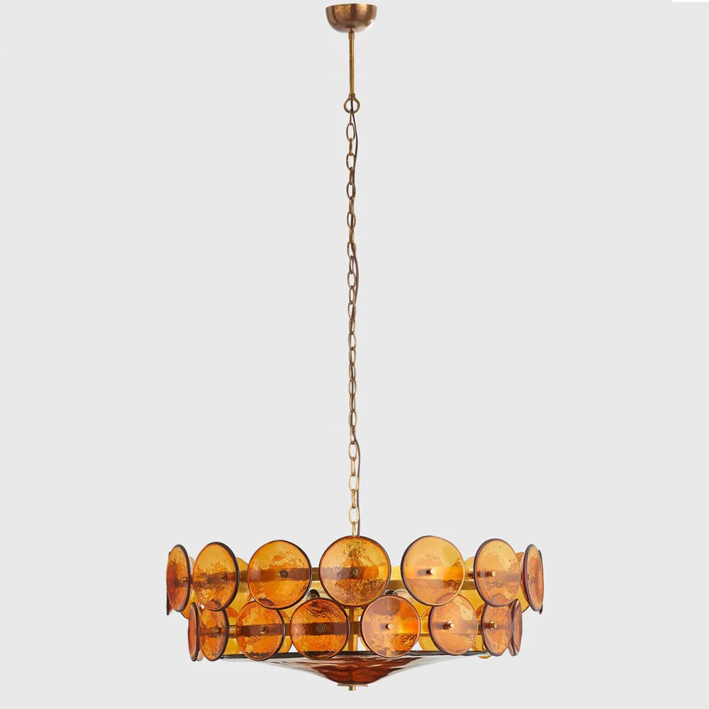The Italian Retro Pendant Light features a gold metal frame and multiple amber glass discs in a round, Mid-Century Modern design—perfect for adding Italian artisan-inspired style to your space.
