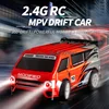 1:16 4WD MPV Electric Remote Control Truck Model 2.4G Angel Eye Headlight 360° High Speed Drift RC Car Truck With Dual Set Wheel 3