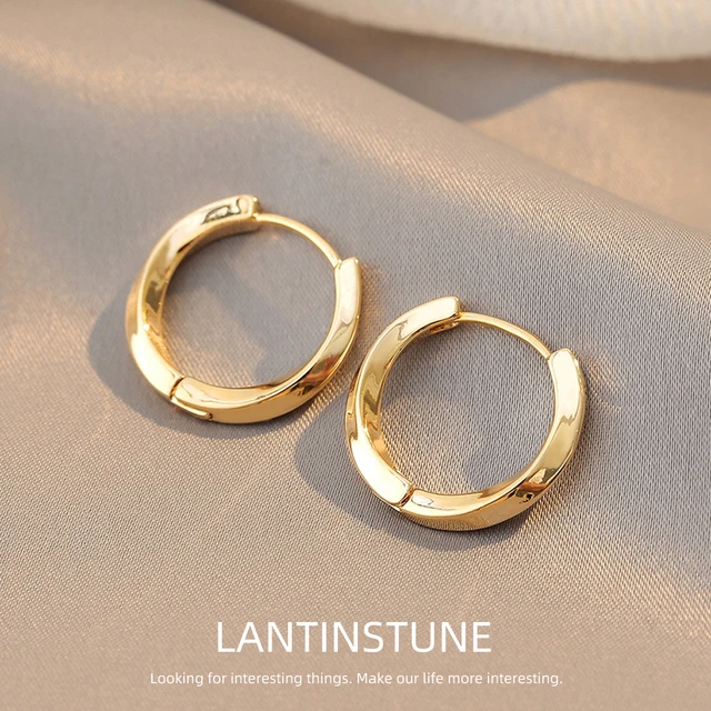 Dextera hoop earrings, Asymmetrical design, Interlocking loop, White, Gold-tone  plated