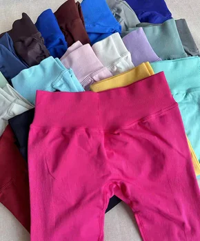 Leggings da palestra a vita alta Leggings da yoga senza cuciture Collant sportivi push-up per donna Pantaloni da corsa fitness ad alta elasticità Abbigliamento da palestra per sollevamento dell'anca