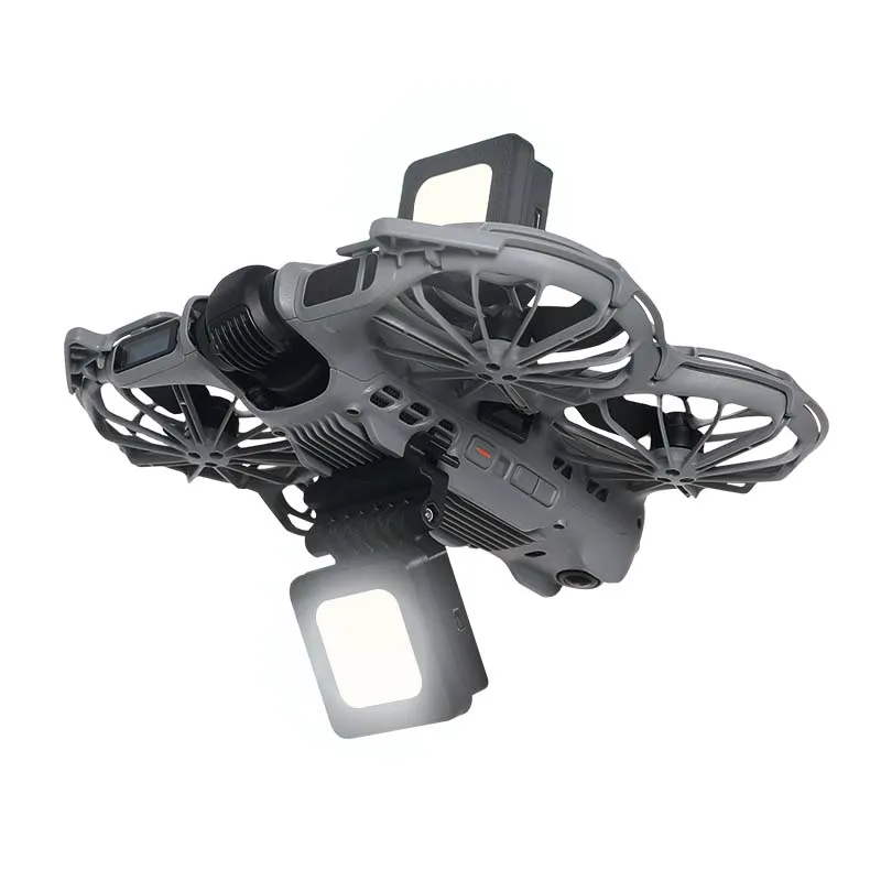 Feu LED rechargeable avec dégagement rapide, détaché du drone DJI Neo 2, montrant son connecteur magnétique.