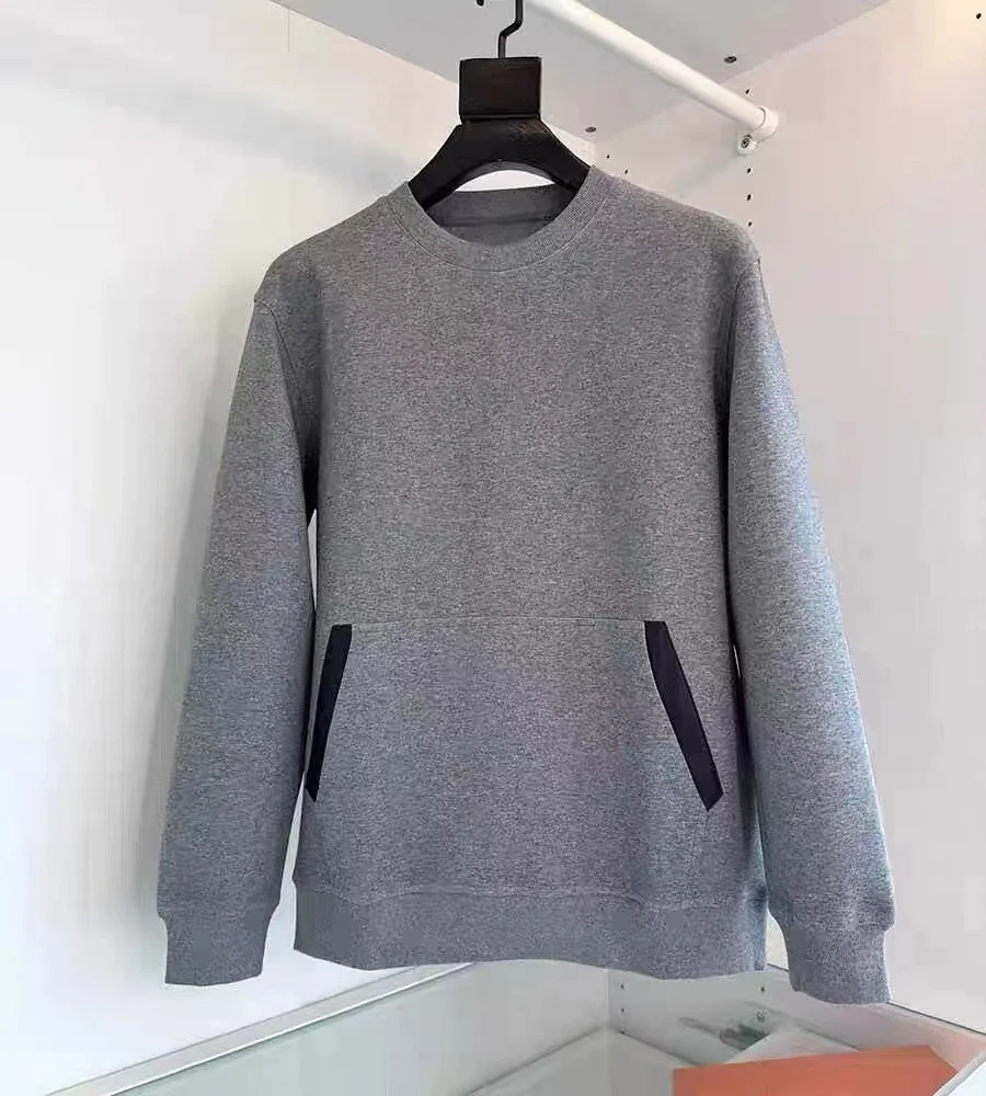 Sudadera con capucha de manga larga con cuello redondo en H de algodón de color sólido de alta gama para hombre de otoño e invierno