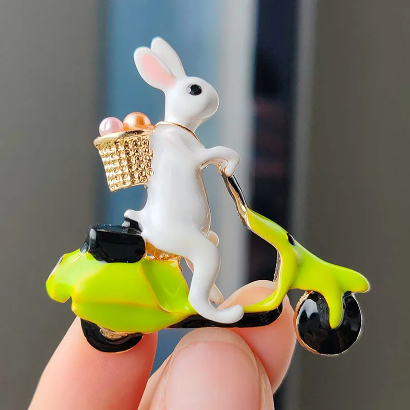 

Enamel Rabbit Brooches For Women Clothes Lovely Rabbit Riding Bike Carry Pearl Basket Cute Animal Brooch Pins Party Jewelry Gift