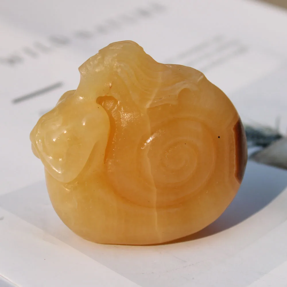 

Hand Carved Wholesale Price Natural Yellow Calcite Stone Crystal Healing Conch Fairy Carving For Home Decoration