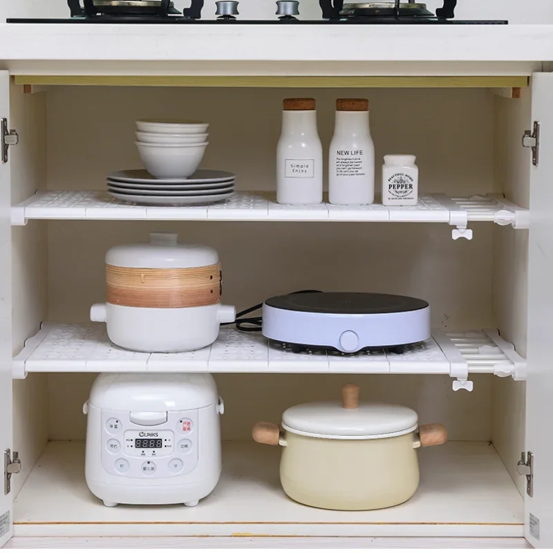 https://ae01.alicdn.com/kf/Sc75d1af166c944999781e5fb0638b42fg/Adjustable-Wardrobe-Closet-Organizer-Clothes-Storage-Shelves-for-Kitchen-Bathroom-Telescopic-Holders-Shelf-Wall-Mounted-Racks.jpg