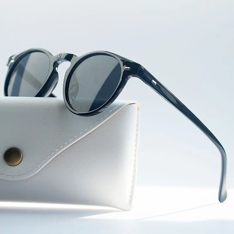 Ronde zonnebril voor dames en heren vintage designerbril_voghion.com