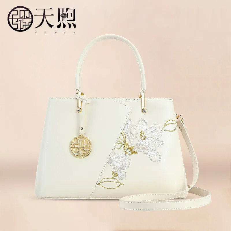 

PMSIX handbag Female 2023 new upscale atmosphere embroidery mother bag middle-aged hand carry bag cowhide crossbody bag