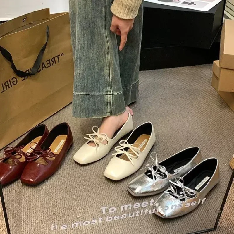 Mocassins dorés à noeud pour poupée 28 cm - Chaussures