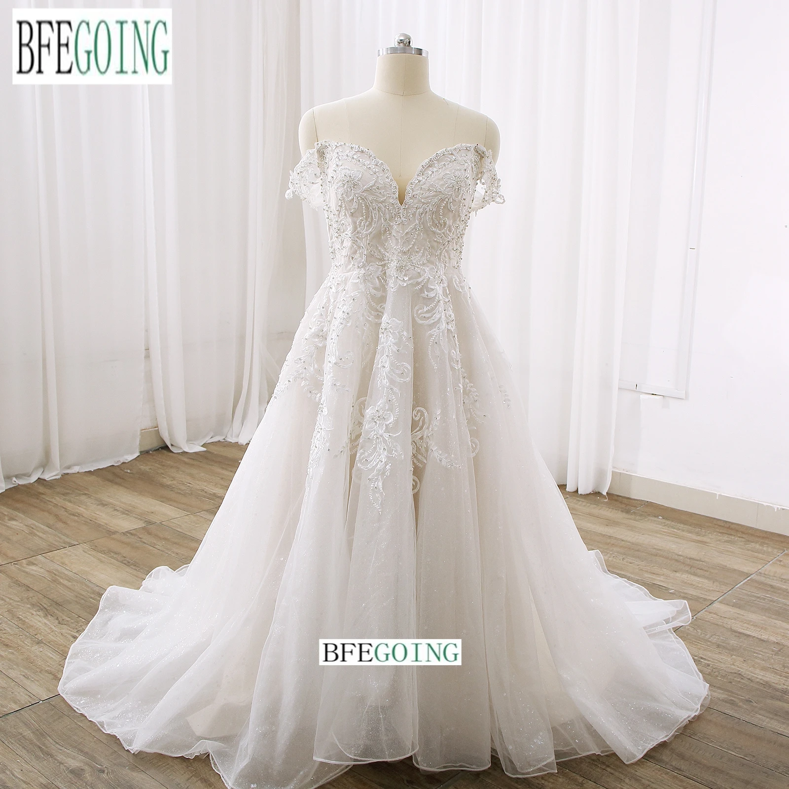 

Ivory Organza A-Line Wedding Dresses Chapel Custom Made Sweetheart Bridal Gowns Off The Shoulder Beading Tulle