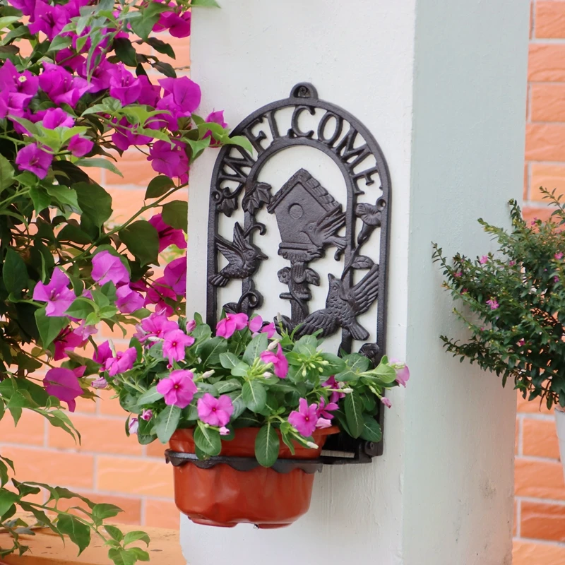 

Винтажная черная чугунная настенная подставка для растений с приветственным знаком