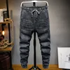 Large size jeans black men's  man plus size harem pants autumn elastic stretch Slim feet trousers 7XL 6XL 5XL 1