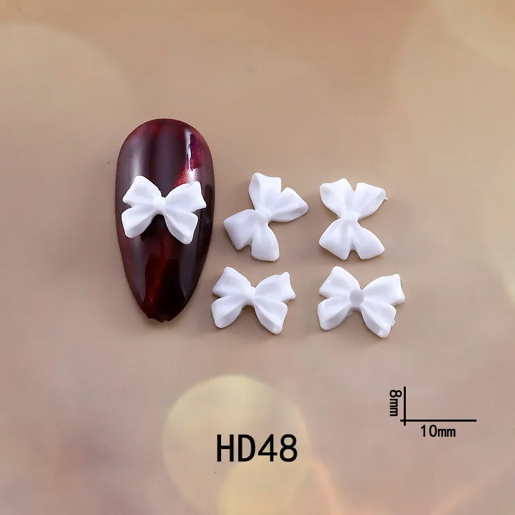 

50/100Pcs Christmas Bowknot 3D Nail Art Charms Lovely Fairy Resin Ribbon Bow Nail Art Decor DIY Flat-back Bowtie Manicure Parts
