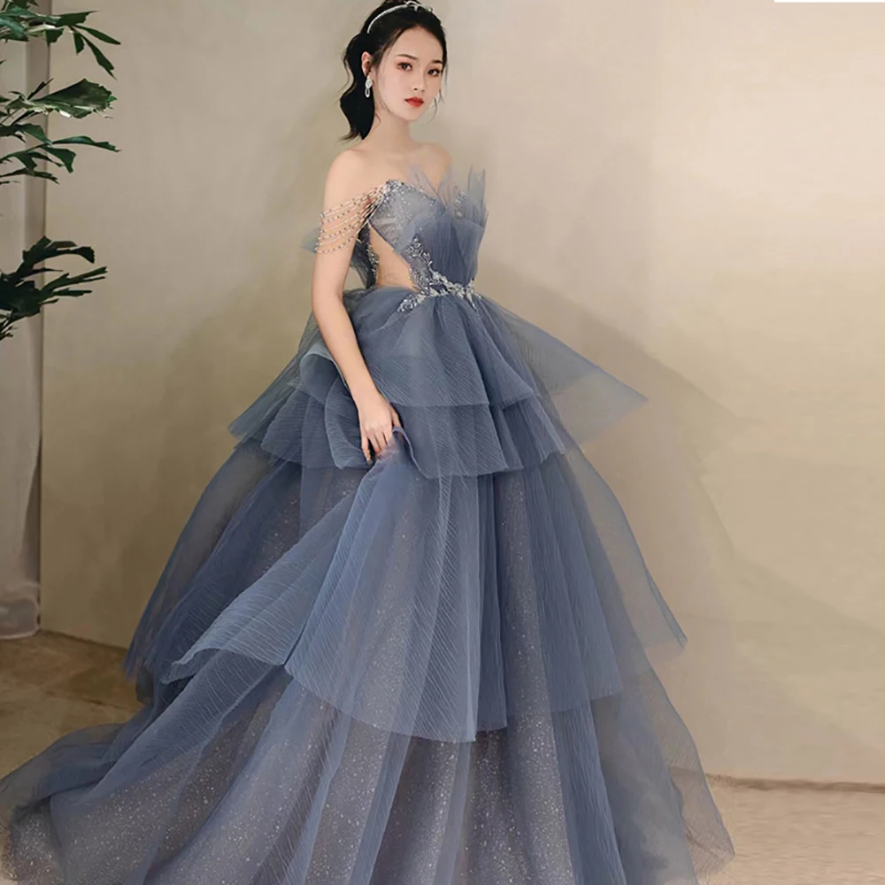 

Dreamy Sparkle Beading Tiered Tulle Evening Dress Custom Made Spaghetti Straps Tassels Navy Blue Sweetheart Homecoming Prom Gown