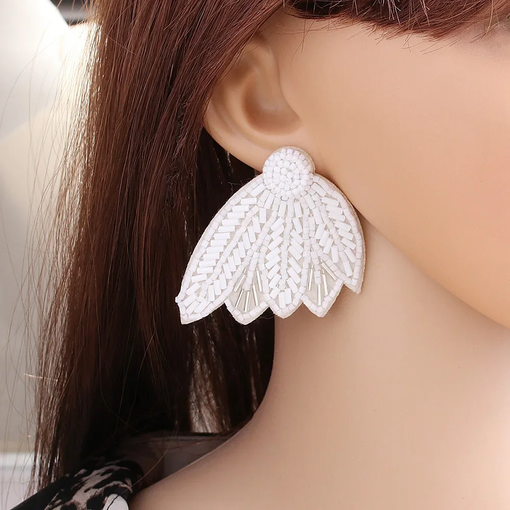 

Beaded earrings Graph Angel Wings Wings Originality Geometry Hand knitting Bohemia Alloy Tide Simple Alloy Rice bead earrings
