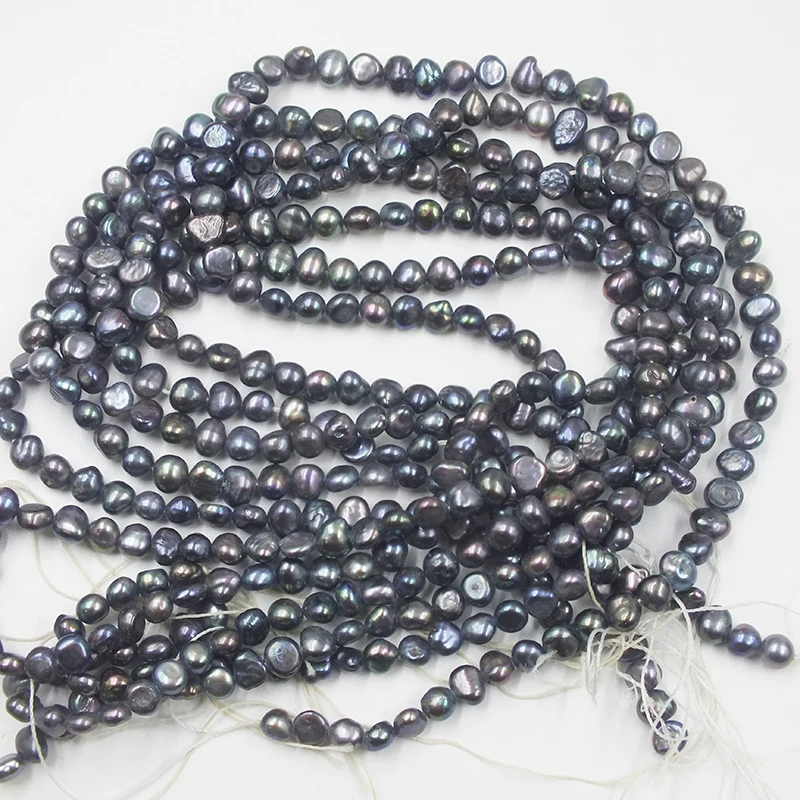 

6 strands of 5MM AAA natural black baroque pearl. Loose bead 15"