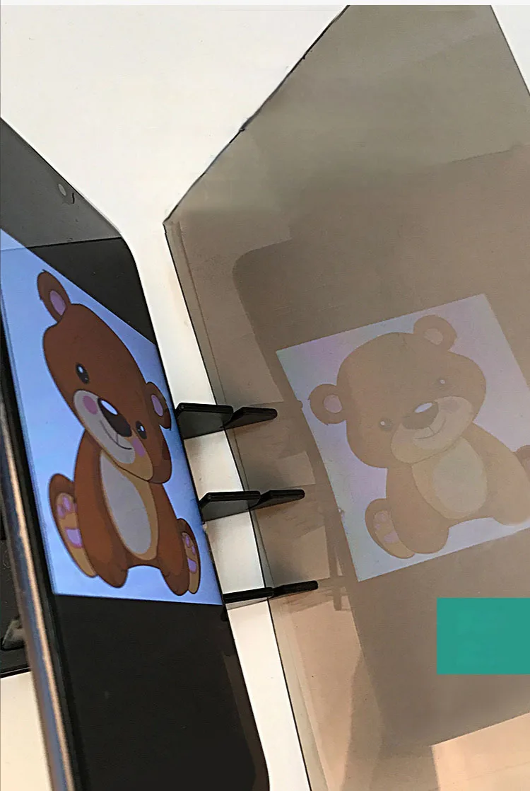 Clear optical lens reflection showing projected image