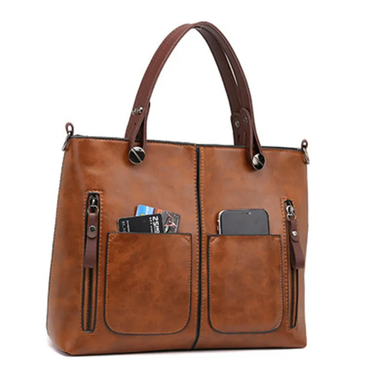 Retro leather handbag with two zipper pockets, versatile tote and crossbody style, classic women’s work and business bag. 1200.3