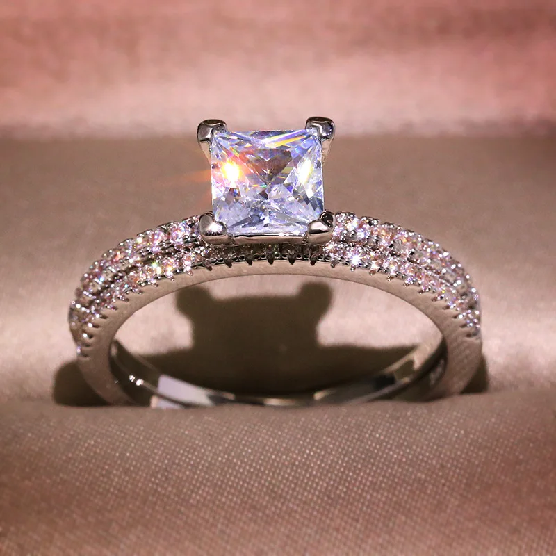 

New Fashion Four-Claw White Zircon Set Ring For Men And Women Simple Couple Platinum Ring With 925 Stamp Party Birthday Gift