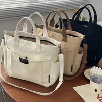 Urban Minimalist Female Student Large Capacity Commuting Horizontal Canvas Single Shoulder Diagonal Cross Portable Tote Bag 1