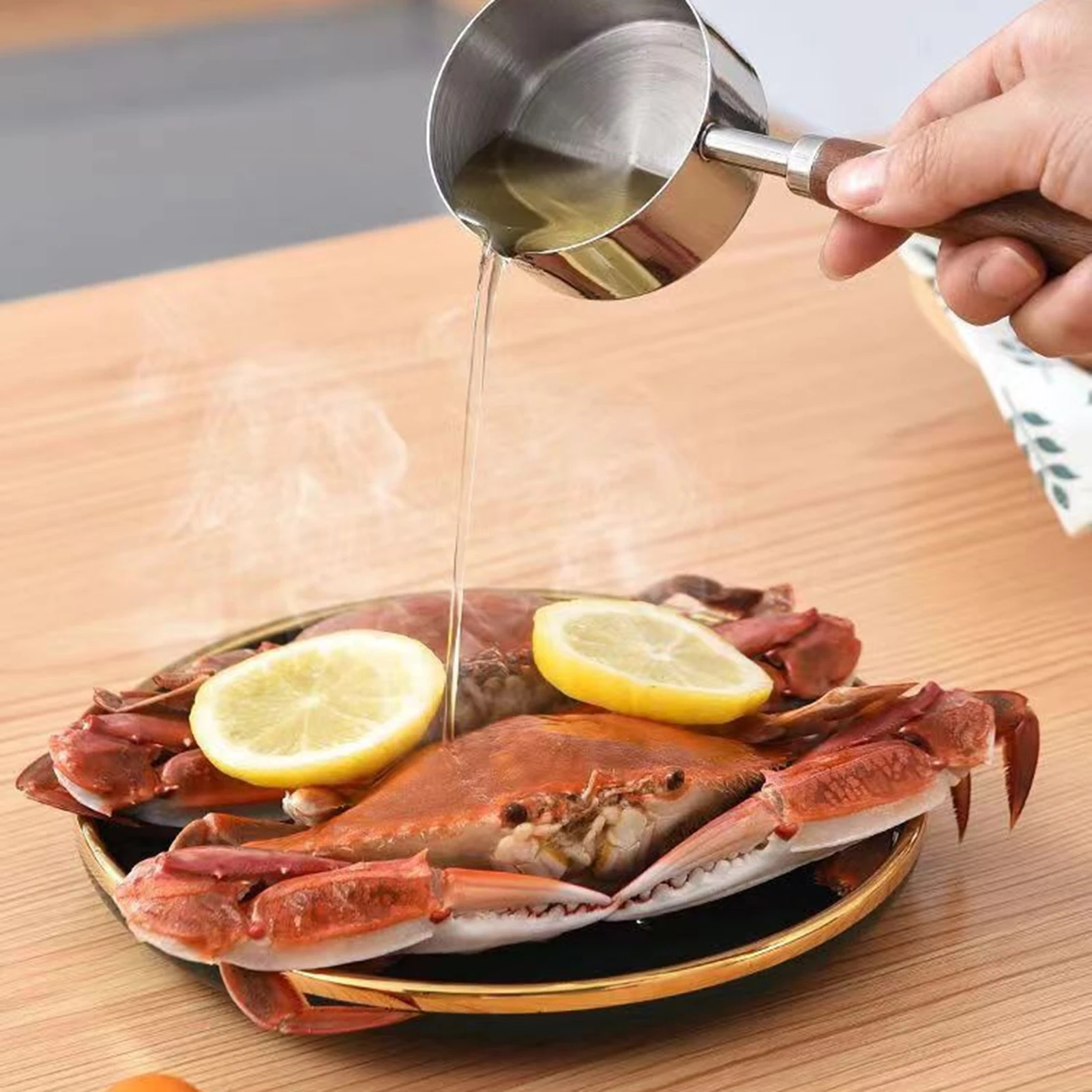 https://ae01.alicdn.com/kf/Sc80747028187412e8c0976bce76c8bdbU/Stainless-Steel-Oil-Pot-with-Wooden-Handle-Multifunctional-Burning-Oil-Dripping-Sauce-Pot-Household-Splash-Oil.jpg