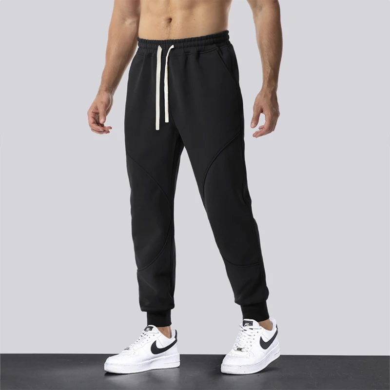 

Casual Men Fiess Sportswear Tracksuit Bottoms Skinny Sweatpants Cotton Trousers Gyms Jogger Track Pants Mens Joggers