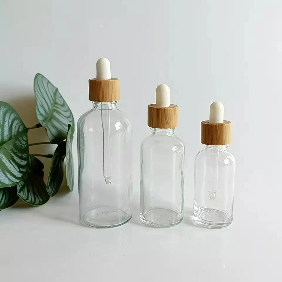 

Wholesale 5ml 10ml 15ml 20ml 30ml 50ml 100ml Clear Glass Essential Oil Perfume Dropper Bottle Bamboo Lid Serum CosmeticContainer