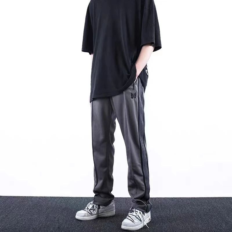 

Grey Needles Sweatpants High Quality 1:1 Mens Womens Knitted Striped Smooth Fabric Needles Trousers Butterfly Logo Sweatpants
