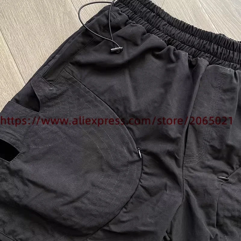 Whoisjacov pair of Puffer Shorts Cargo Men Women High Quality Multi Pocket Oversize Breeches 4