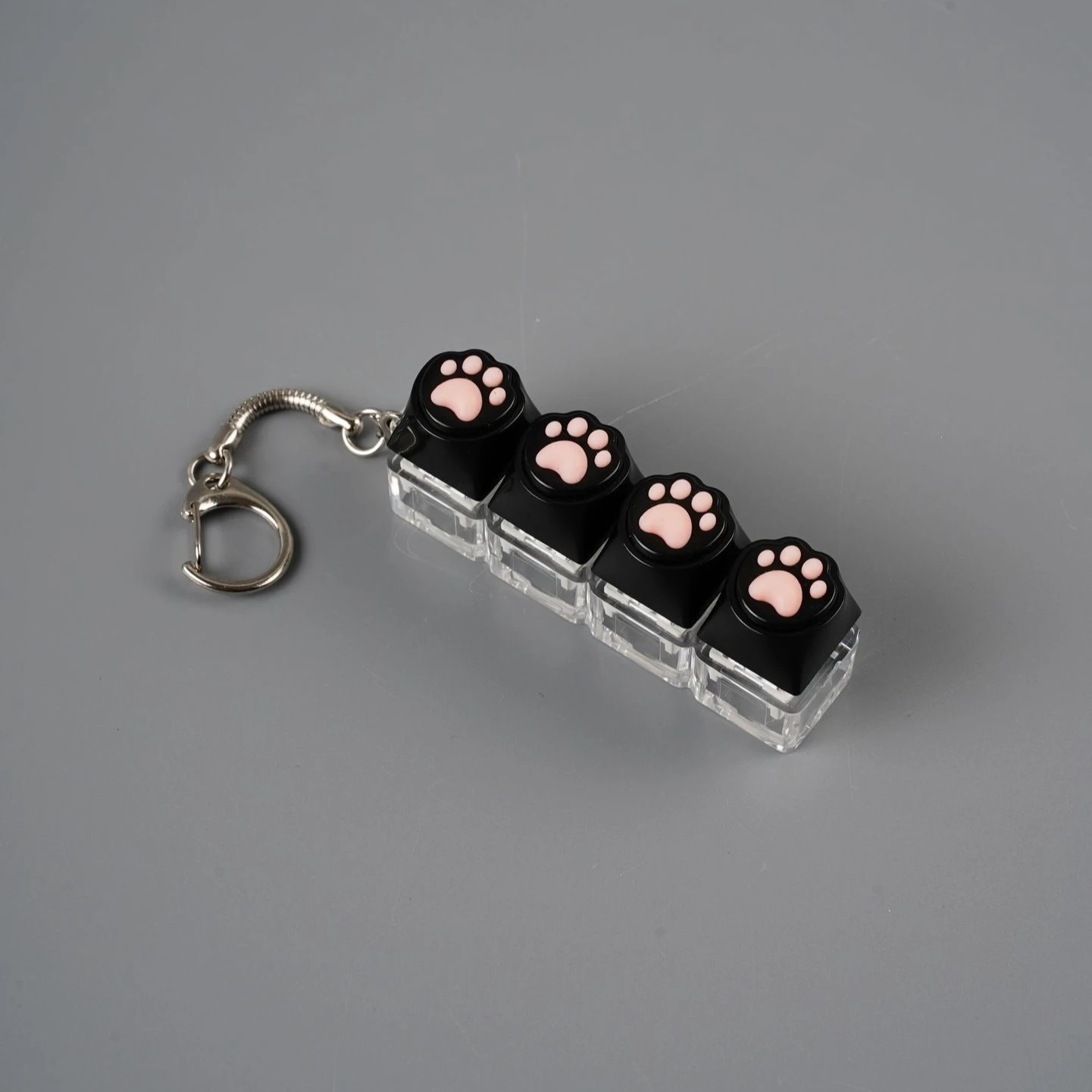 Tragbarer Silikon-Katzenpfoten-Klicker Schlüsselanhänger LED-Licht Leuchtendes Fidget-Spielzeug Tastatur-Stil Knopf Stress- und Angstabbau Geschenk – Detail 13