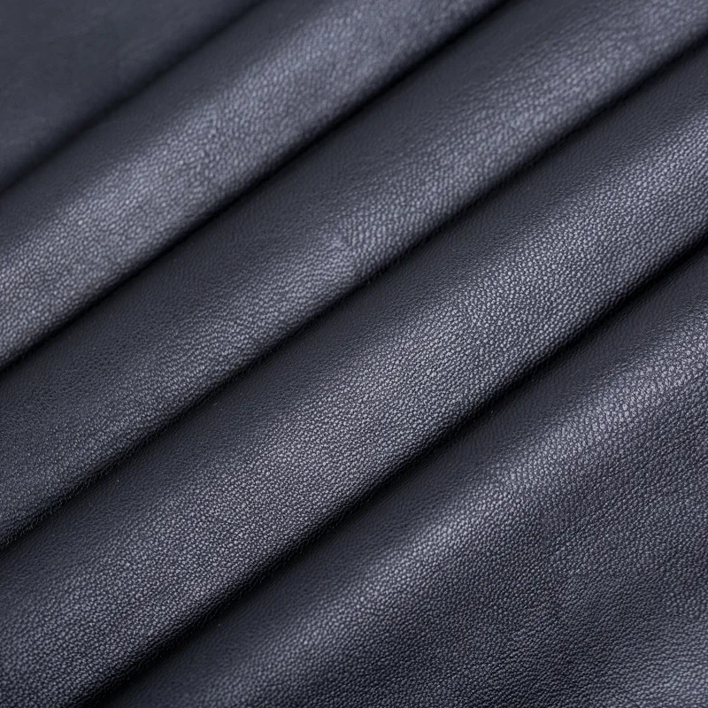 Skin-friendly PU Leather Fabric Sheepskin Patterned Drapery Artificial Clothing Material for Men Women Children And Babies