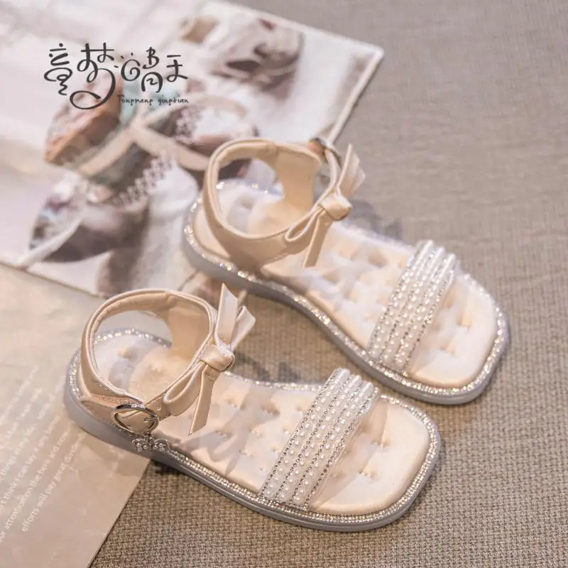 

Girls sandals 2022 summer new casual children's rhinestone princess beach shoes soft bottom non-slip bow fashion pearl kids shoe