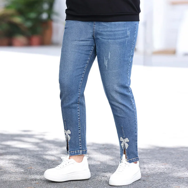 

Plus Size Studded Rhinestone Slit Pencil Jeans 7xl Mid Waist Stretch Frayed Ninth Demin Feet Pant Bow Drill Ankle Length Trouser