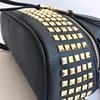 Classic solid color backpack High-end women's fashion backpack launched a new women's handbag casual backpack mobile phone bag b 4