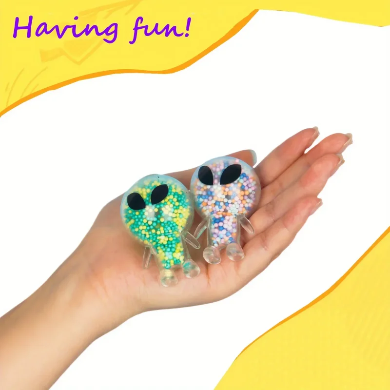 2 stuks mini-squishy speelgoedjes in de vorm van aliens om stress te verlichten, perfect als feestcadeautje. Grappige balletjes in de vorm van buitenaardse wezens, ideaal om mee te friemelen._voghion.com