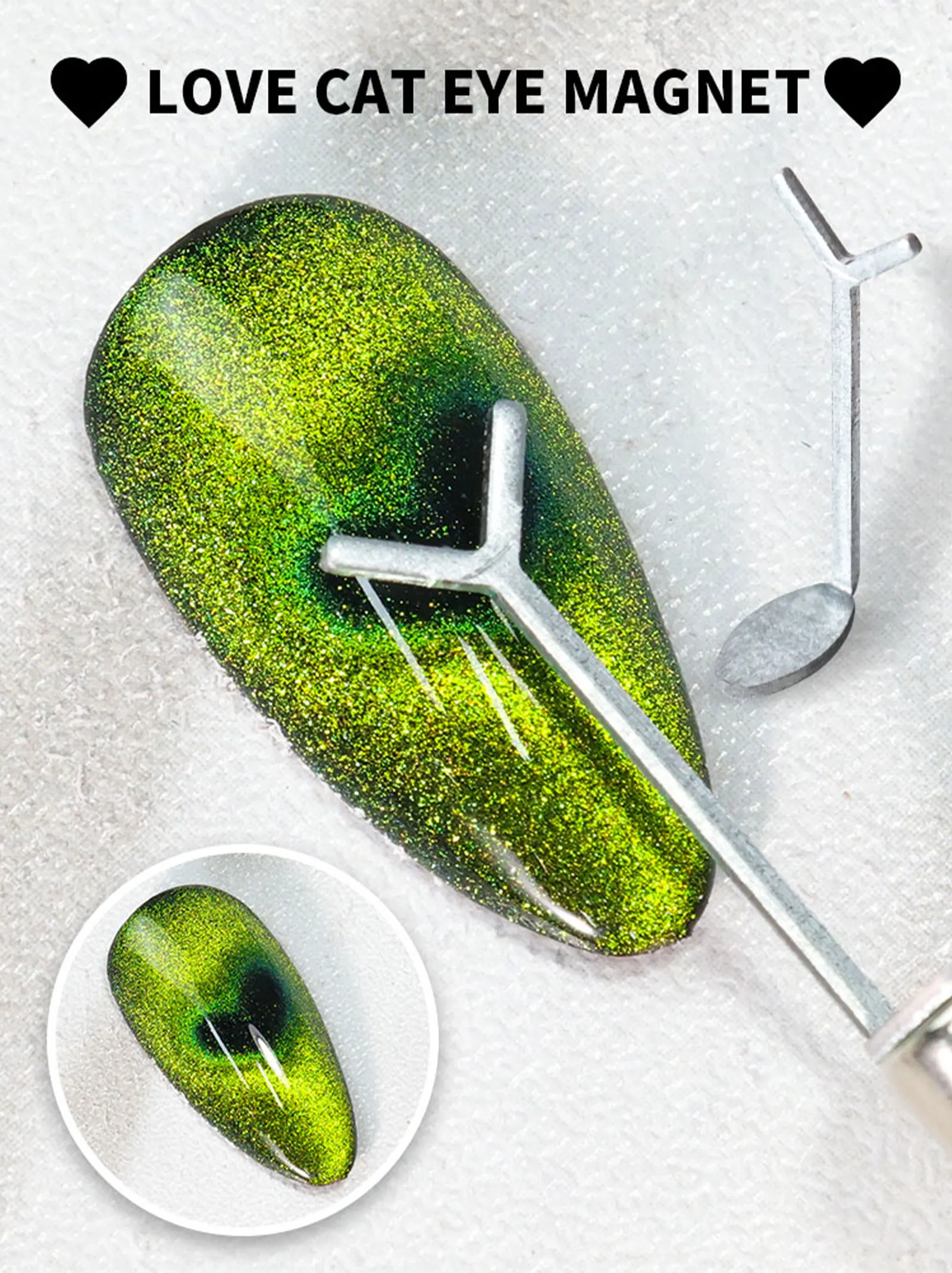 Magnet na nehty ve tvaru srdce kočičí oko ležící na stole