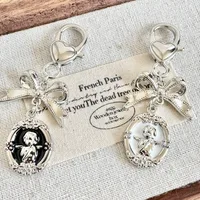 Porte-clés nœud d'ange pour femmes, pendentif de sac en métal Vintage, tendance fille coeur porte-clés voiture porte-clés ami Couple cadeaux 2
