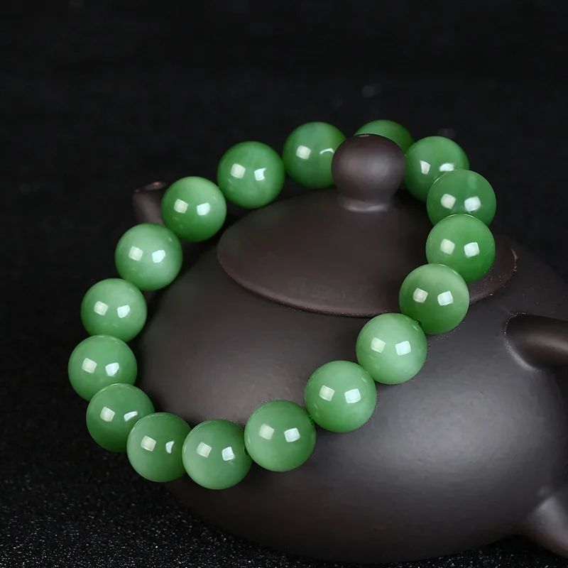 

Шариковый браслет Hetian Jade кошачий глаз 12 мм