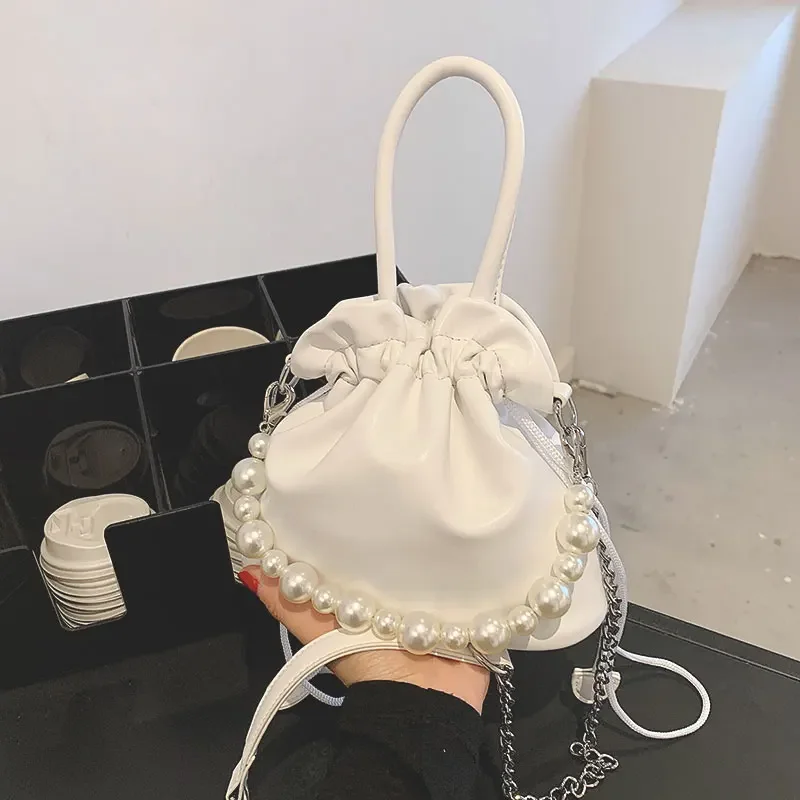 Hand-held pleated bag for women summer 2023 new trendy fashion pearl bucket bag niche design versatile crossbody bag