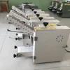 Commercial Spring Roll Skin Maker Crepe Tortilla Chapati Roti Machine empanadas making machine price 2