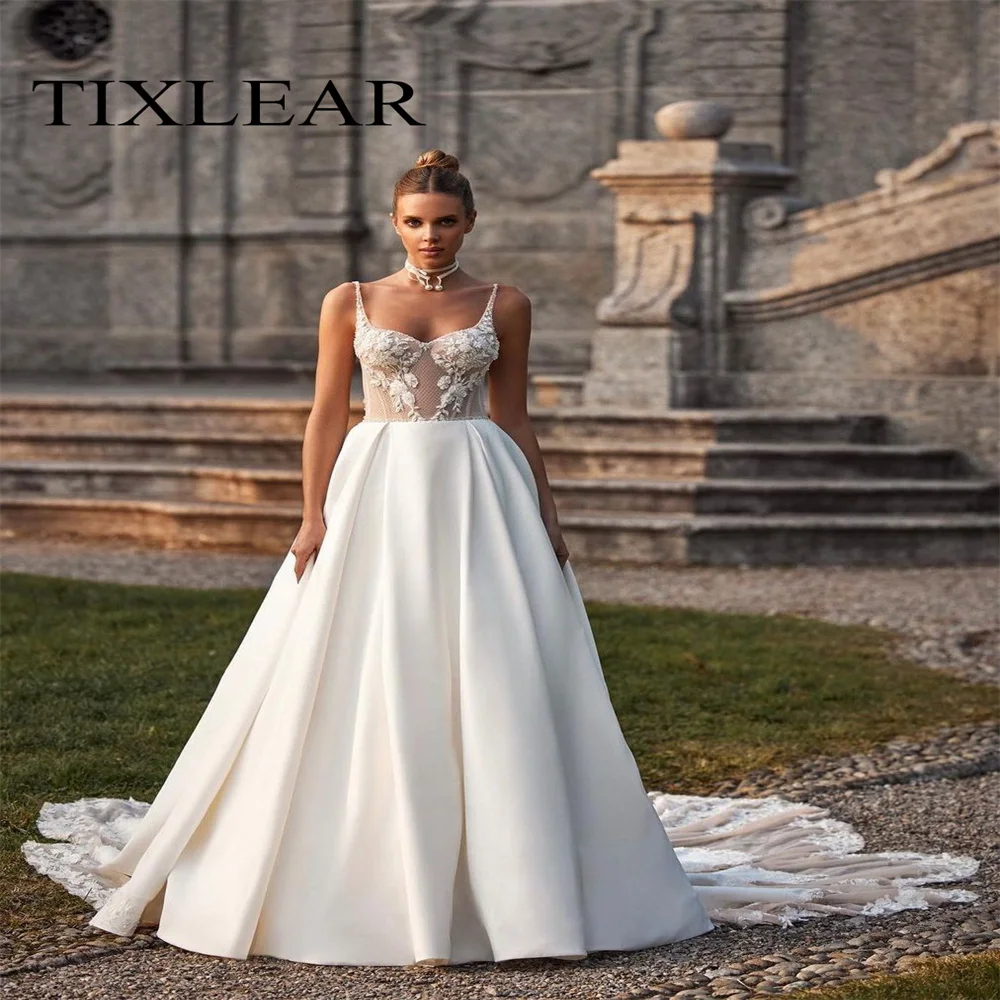 

TIXLEAR Luxry Wedding Dress Sweetheart Appliques Sphgetti Straps Sleeveles Backless Satin Bridal Ball Gown Vestido De Noiva New