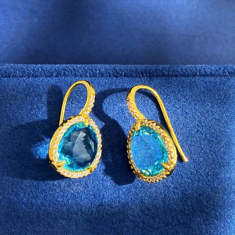 Crystal blue transparent gemstone style triangular earrings