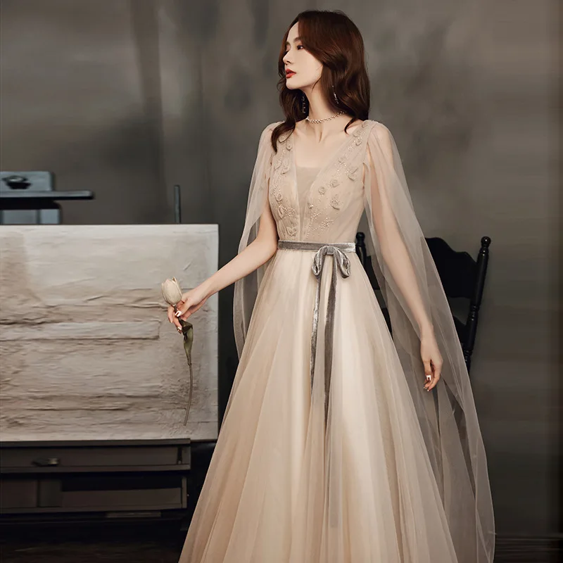 

Женское вечернее платье цвета шампанского, с V-образным вырезом и аппликацией из бисера