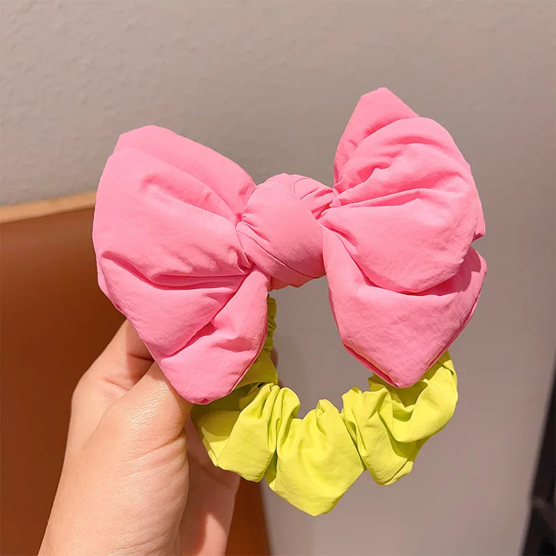 Charming Bow Bells Scrunchies: Fashionable & Versatile Hair Accessories