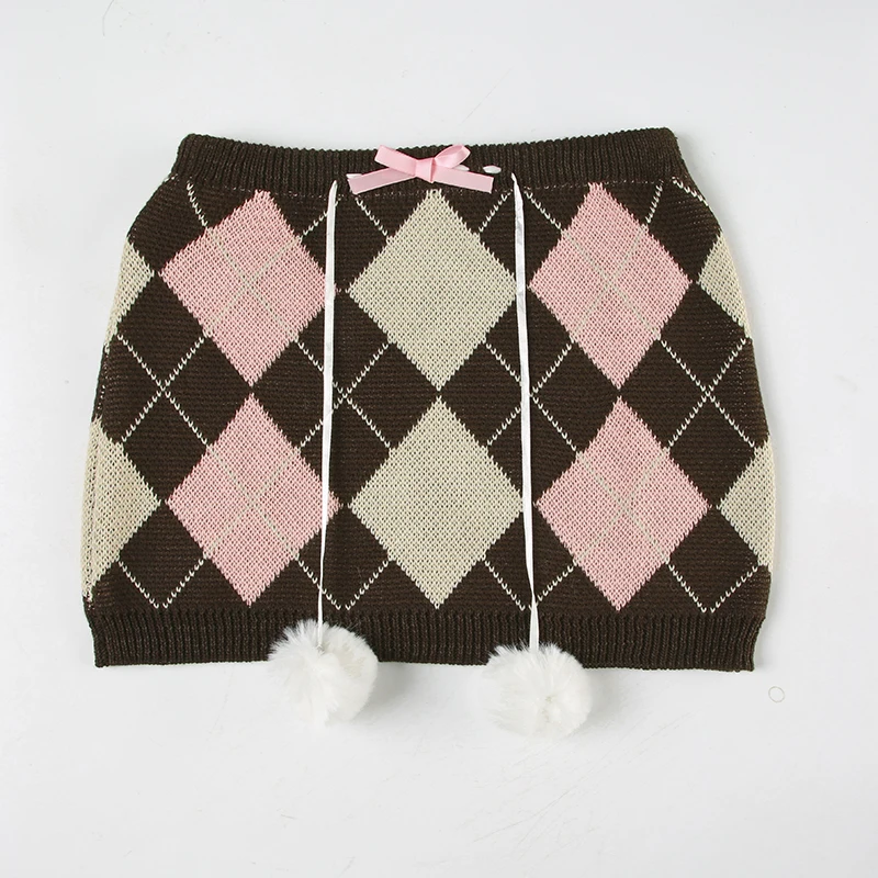 Faldas de punto otoñales con rombos, bonitas y dulces, a cuadros, con bolas de peluche y lazos, a la moda.
