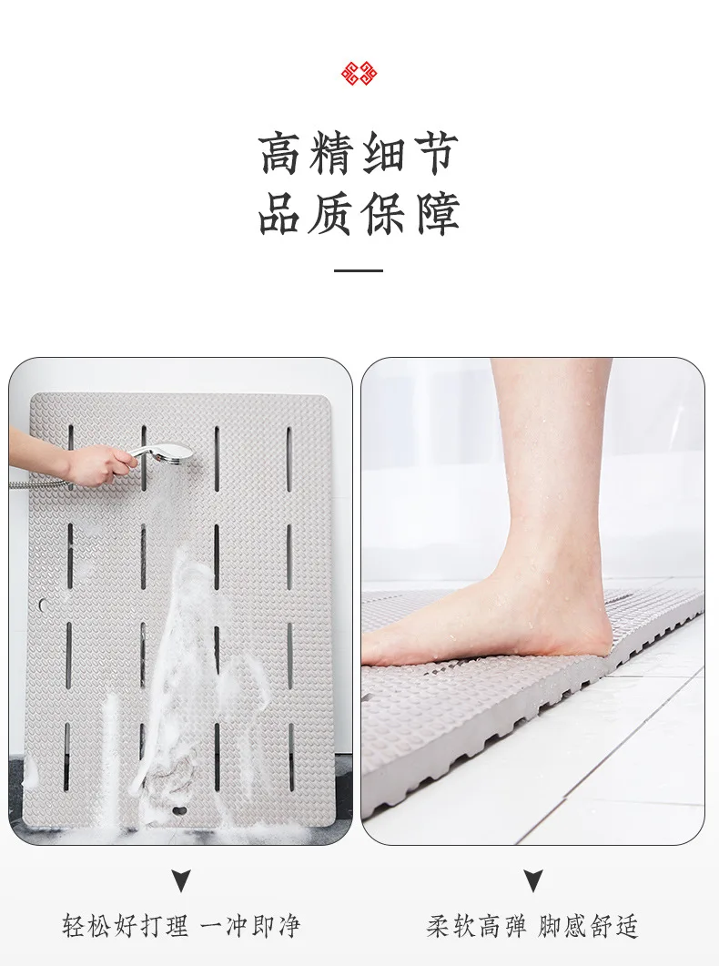 Lightweight gray perforated non-slip bathroom mat on a wet shower floor.
