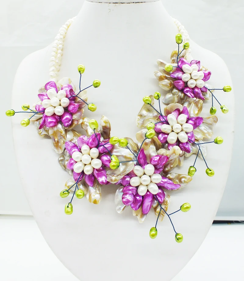 

Excellent ! 100% of freshwater pearls, classic flower necklace 20"
