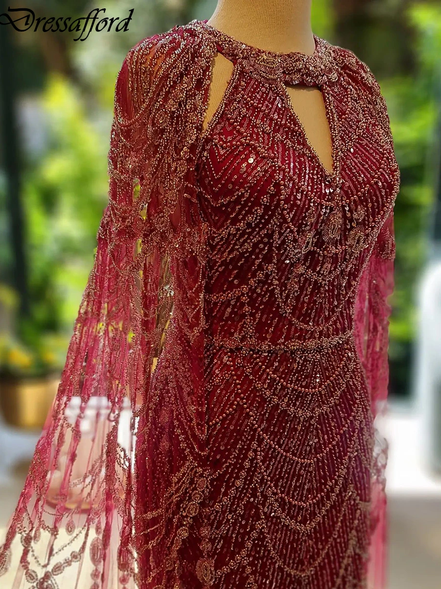 

Red O-Neck Beading Crystal Dubai Mermaid Evening Dress With Cape Sleeveless Formal Party Wear Gown