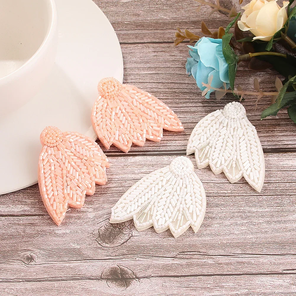 

Rice bead earrings Originality Design Angel Wings Wings Hand knitting Bohemia Alloy Fashion Simple Beaded earrings