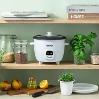 6-Cup Rice & Grain Cooker Bonded Granite® Pot One-Touch Design Keep-Warm Mode Accessories Included Easy to Clean Premium Glass 2