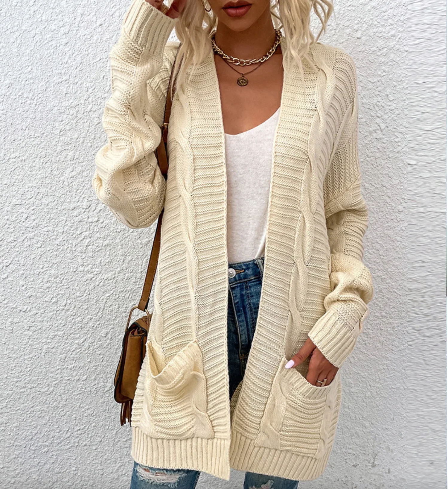 

Women's autumn and winter new Fried Dough Twists medium length knitting cardigan women's foreign trade solid color sweater coat